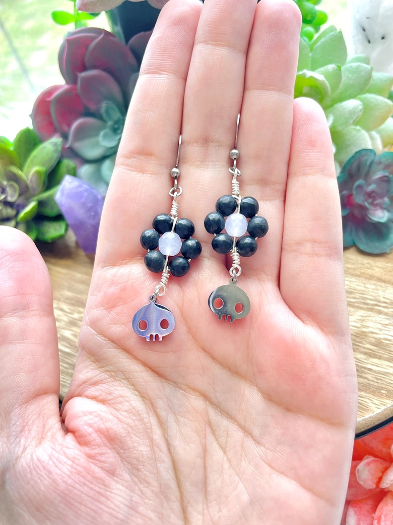 Wire wrapped blackstone beaded flower earrings with skull charm