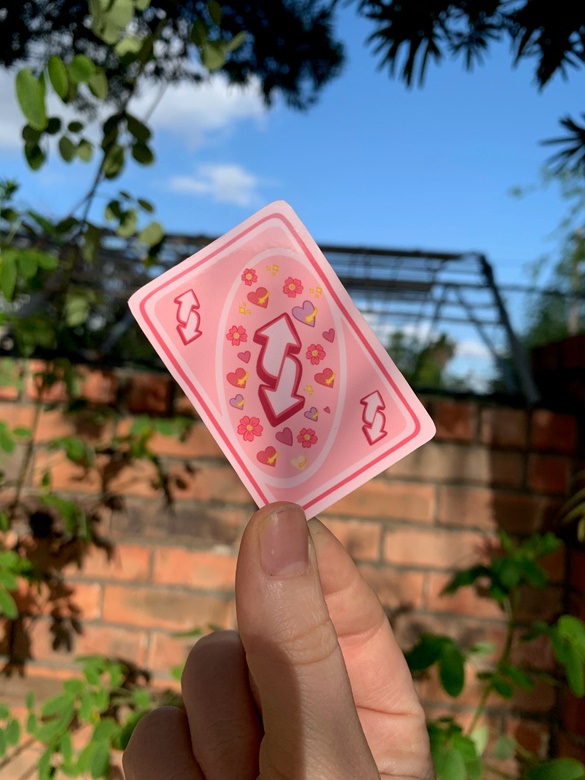 Pink Uno reverse card