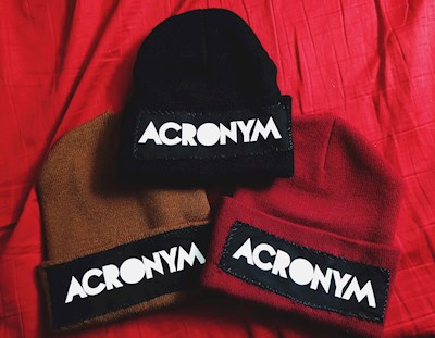 Hats can be snagged at acronymofficial.com/shop