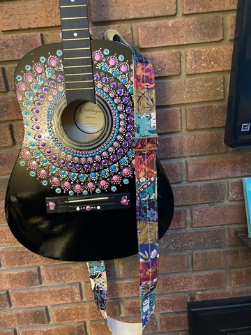 Marley's Guitar with snippet roll strap