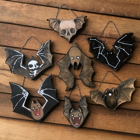 Handmade, spooky-cute wooden bats