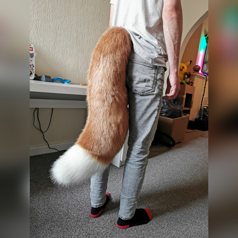 Teal fox tail