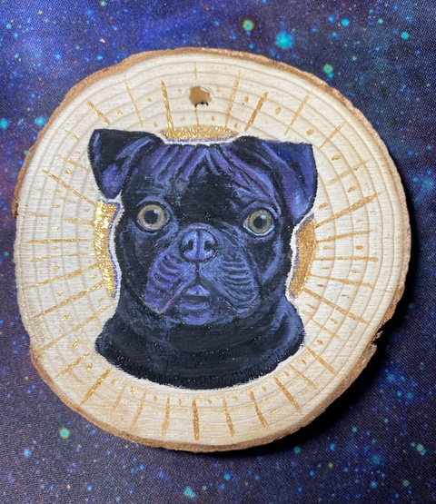 Pug portrait on wood disk