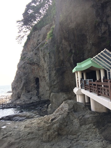 rocky cliff beside iwaya sea cave