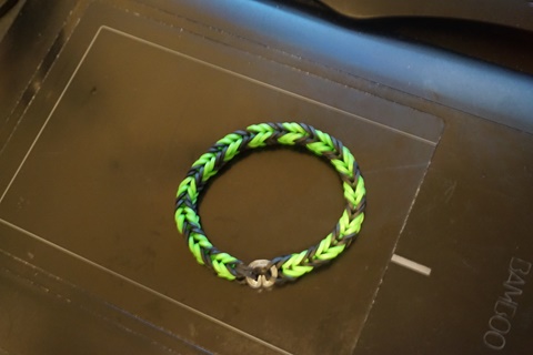 black and green rubber band bracelet 
